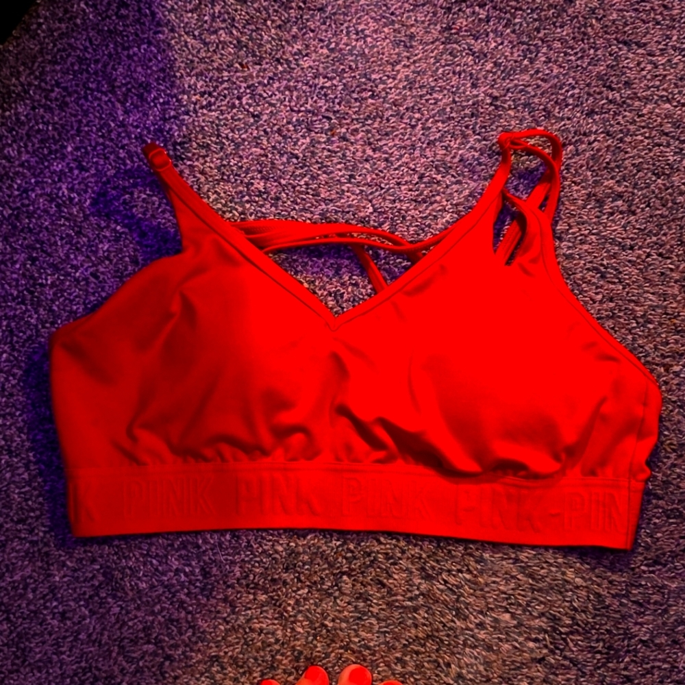 Pink sports bra.  Not sure if you would call it orange or red